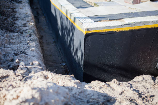 Professional Emergency Waterproofing technician working in Amherst, VA